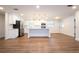 Updated kitchen featuring white cabinets, stainless steel appliances, and an island at 1124 Munster St, Orlando, FL 32803
