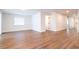Spacious living area showcasing wood-look flooring at 1124 Munster St, Orlando, FL 32803