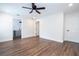 Spacious main bedroom with ceiling fan and access to bathroom at 1124 Munster St, Orlando, FL 32803