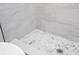 Modern shower with gray and white marble-look tiles at 1124 Munster St, Orlando, FL 32803