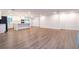 Bright and spacious living room with wood-look flooring at 1124 Munster St, Orlando, FL 32803