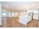 Open concept kitchen with island and stainless steel appliances at 1124 Munster St, Orlando, FL 32803