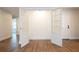Bright storage room with hardwood floors and white walls at 1124 Munster St, Orlando, FL 32803