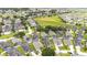 Aerial view of a community with houses and pools at 441 Montara Dr, Davenport, FL 33897