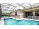 Relaxing screened pool and spa area at 441 Montara Dr, Davenport, FL 33897