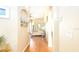 Bright entryway with wood floors and view of living room at 441 Montara Dr, Davenport, FL 33897