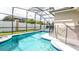 Screened pool and spa with patio furniture at 441 Montara Dr, Davenport, FL 33897