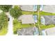 Aerial view of a house with a pool in a residential neighborhood at 441 Montara Dr, Davenport, FL 33897