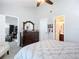 Main bedroom with ensuite bathroom and dresser at 1092 Providence Blvd, Deltona, FL 32725