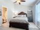 Cozy bedroom with a queen-size bed and en-suite bathroom at 1092 Providence Blvd, Deltona, FL 32725