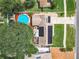 Aerial view of house with solar panels, pool, and large backyard at 1092 Providence Blvd, Deltona, FL 32725