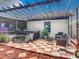 Relaxing patio with pergola, hot tub, and seating area at 1092 Providence Blvd, Deltona, FL 32725