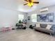 Versatile room with a desk, sofa, and plenty of natural light at 1092 Providence Blvd, Deltona, FL 32725