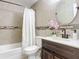 Clean bathroom, featuring a shower/tub combo and updated vanity at 1092 Providence Blvd, Deltona, FL 32725