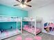 Bright bedroom with two bunk beds, offering ample sleeping space at 1092 Providence Blvd, Deltona, FL 32725