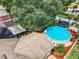 Aerial view showing house, pool, and backyard at 1092 Providence Blvd, Deltona, FL 32725