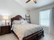Bedroom with queen bed, nightstand and window with blinds at 1092 Providence Blvd, Deltona, FL 32725