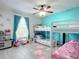 bedroom with twin bunk beds and teal walls at 1092 Providence Blvd, Deltona, FL 32725