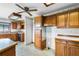 Bright kitchen with wood cabinets and an island at 1005 Crescent Pkwy, Deland, FL 32724