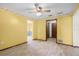 Dining area with yellow walls and wood-look floors at 1005 Crescent Pkwy, Deland, FL 32724