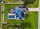 Overhead view of house with solar panels and pool at 1005 Crescent Pkwy, Deland, FL 32724