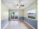 Spacious dining room with light walls and wood floors at 1005 Crescent Pkwy, Deland, FL 32724