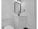 Simple bathroom with white vanity and black fixtures at 3133 Bon Air Dr, Orlando, FL 32818