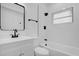 Clean bathroom with white vanity, bathtub, and shower at 3133 Bon Air Dr, Orlando, FL 32818