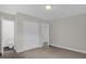 Bedroom with carpet, double doors leading to bathroom at 3133 Bon Air Dr, Orlando, FL 32818