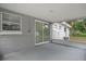 Screened porch with access to backyard, offering additional outdoor space at 3133 Bon Air Dr, Orlando, FL 32818