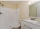 Updated bathroom with white tile and modern vanity at 4806 S Semoran Blvd # 201, Orlando, FL 32822