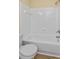 Clean bathroom with a shower/tub combo and tile surround at 4806 S Semoran Blvd # 201, Orlando, FL 32822
