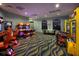 Fun game room featuring arcade games and air hockey at 791 Pebble Beach Dr, Davenport, FL 33896