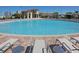 Resort-style pool with plenty of lounge chairs at 791 Pebble Beach Dr, Davenport, FL 33896