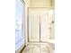 Bathroom with a shower/tub combo, toilet, and dark vanity at 791 Pebble Beach Dr, Davenport, FL 33896