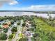 Aerial view of the property and its surroundings, near a lake at 1250 Shorecrest Cir, Clermont, FL 34711