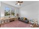 Bright playroom with built-in storage and comfortable seating at 8831 Ribault Ave, Orlando, FL 32832