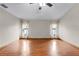 Large bedroom with hardwood floors and ceiling fan at 156 Rachel Lin Ln, Saint Cloud, FL 34771