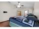 Main bedroom with hardwood floors and ceiling fan at 156 Rachel Lin Ln, Saint Cloud, FL 34771