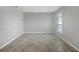 Spacious living room featuring tile floors and neutral walls at 5408 Manchester Dr, St Cloud, FL 34771