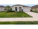 Two-story home with a two-car garage and attractive landscaping at 5408 Manchester Dr, Saint Cloud, FL 34771