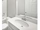 Clean bathroom with single sink vanity and white tile at 5408 Manchester Dr, St Cloud, FL 34771