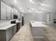 Modern kitchen with gray cabinets and a large island at 5408 Manchester Dr, St Cloud, FL 34771