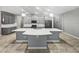 Modern kitchen with gray cabinets and a large island at 5408 Manchester Dr, St Cloud, FL 34771