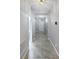 Bright hallway with tile floors and access to rooms at 5408 Manchester Dr, St Cloud, FL 34771