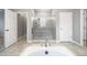 Bathroom with walk-in shower, soaking tub, and double vanity at 5408 Manchester Dr, St Cloud, FL 34771