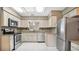 Modern kitchen with stainless steel appliances and granite countertops at 3472 Country Walk Dr, Port Orange, FL 32129