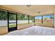 Spacious screened porch overlooking backyard at 3472 Country Walk Dr, Port Orange, FL 32129