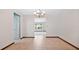 Spacious dining area featuring tile floors and elegant chandelier at 3472 Country Walk Dr, Port Orange, FL 32129