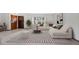 Bright living room with comfortable seating and stylish rug at 3472 Country Walk Dr, Port Orange, FL 32129